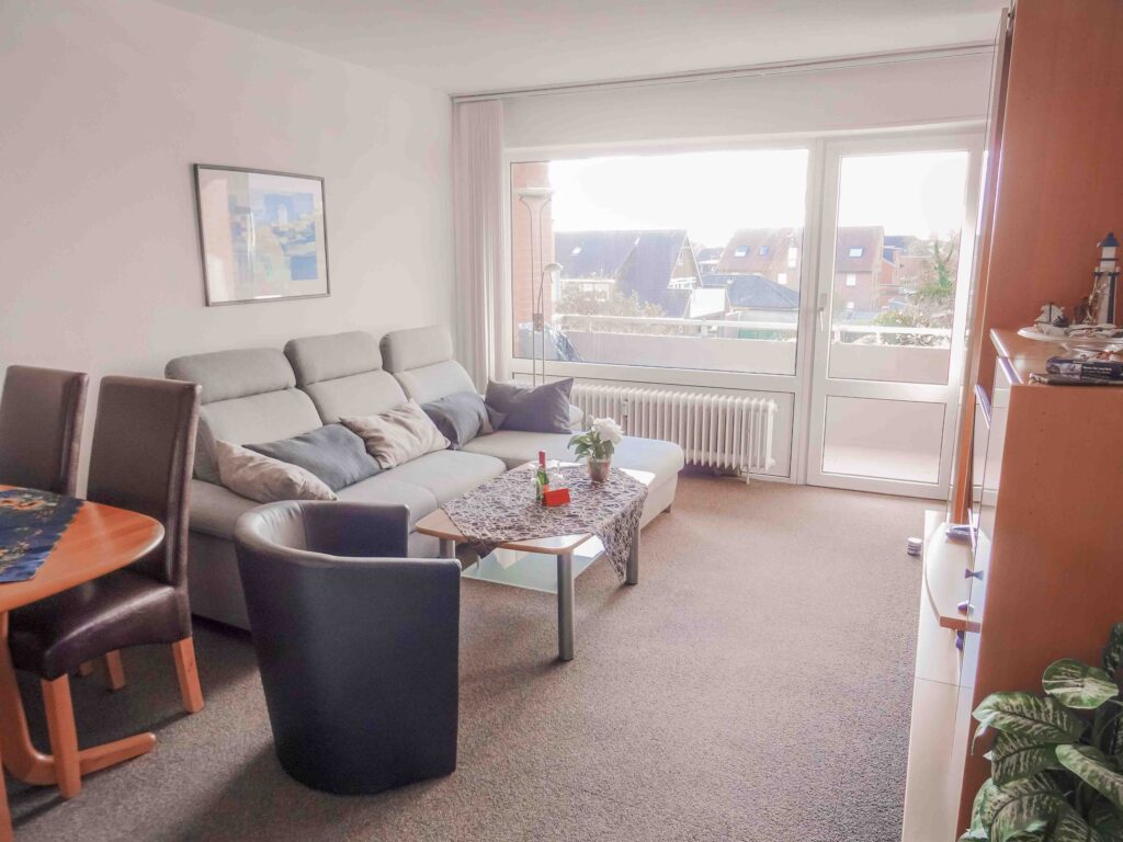 Wohnzimmer mit ausziehbarem Schlafsofa